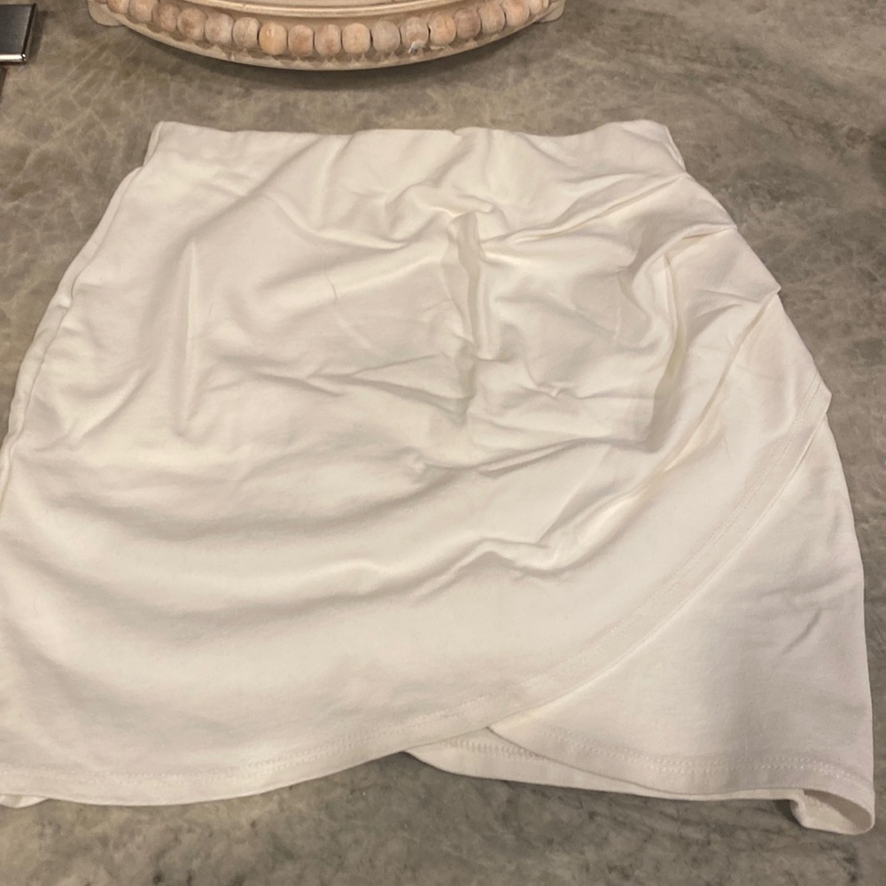 Brand new, stretchy asymmetrical mini.